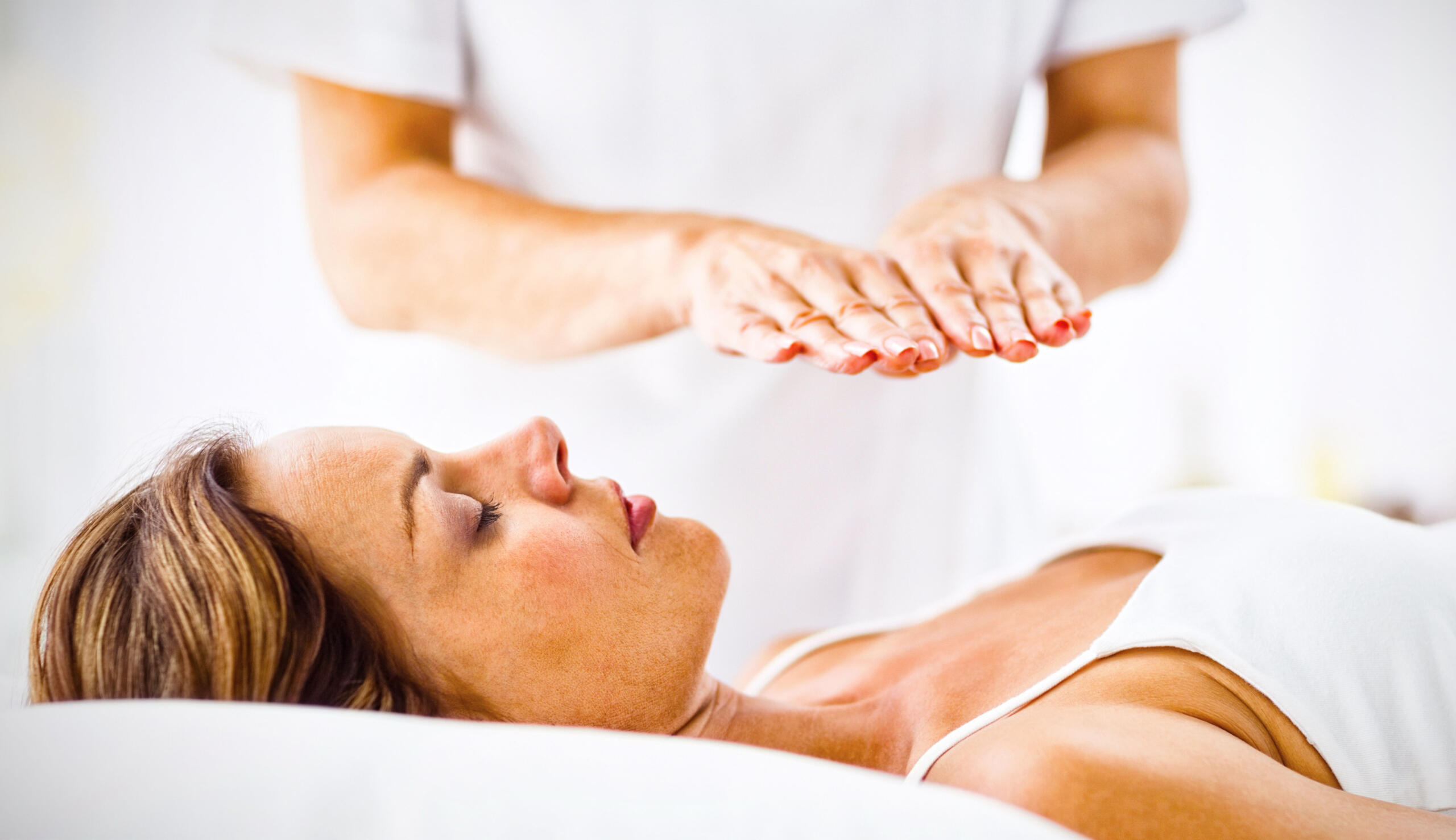 Woman reciving reiki